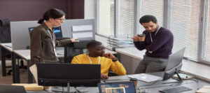 Group of business people working on project in IT development office